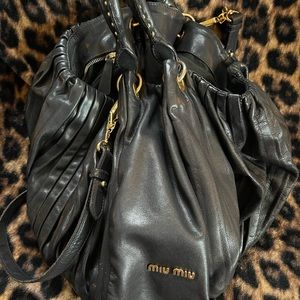 H 12in L 18in W 10in Gently used bag.